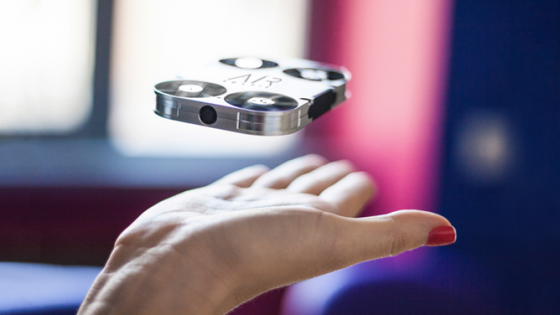 Pocket-sized AirSelfie camera drone in hand